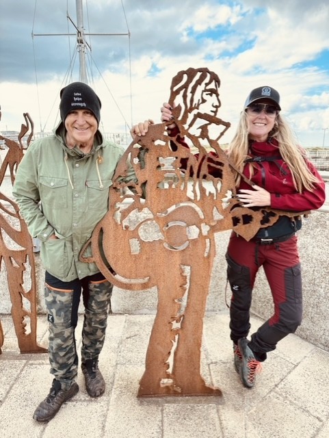 Mike and Jules Peters at his statue in Rhyl. Image: Jules Peters